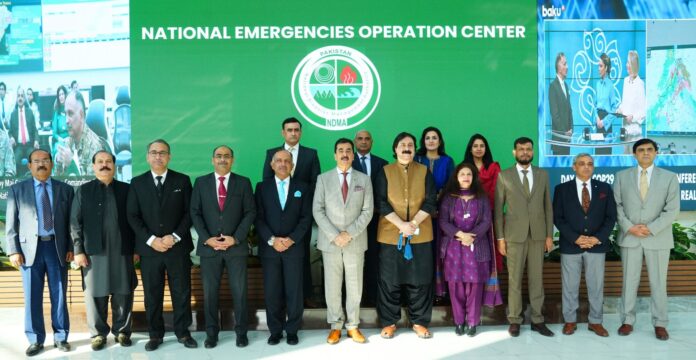 Senate chairman explores NEOC, lauds technology-driven disaster response system