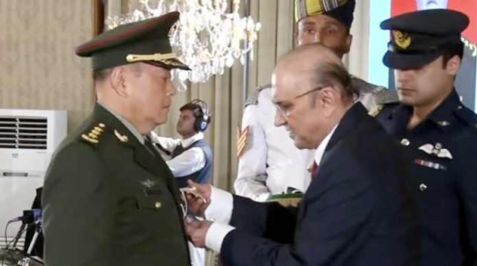 President Zardari confers Nishan-i-Imtiaz (Military) award on Chinese General Li Qiaoming