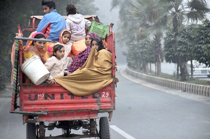 A nomadic family on the way to shift their place.