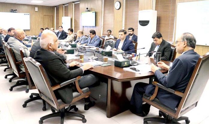 Federal Minister for Planning, Development and Special Initiatives, Ahsan Iqbal chairing a meeting to review the progress and challenges of two major national projects: the Neelum Jhelum Hydropower Project (NJHPP) and the Diamer Bhasha Dam.