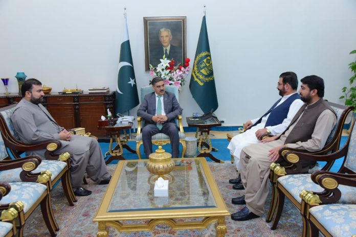 Asim Kurd felicitates caretaker PM