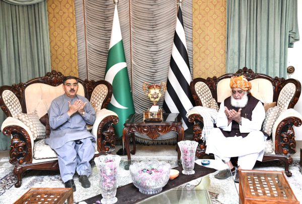 Caretaker PM visits Maulana Fazl’s residence to condole over death of party workers