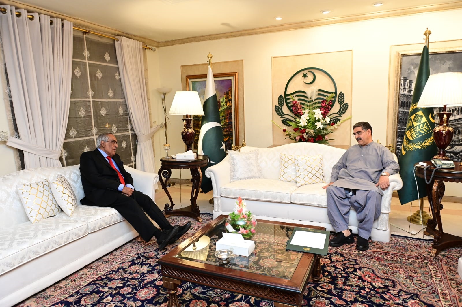 Senator Muzaffar felicitates PM on assuming office